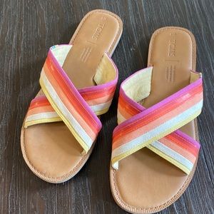 Tom’s ladies sandals in size 7 with crisscross brightly coloured straps.